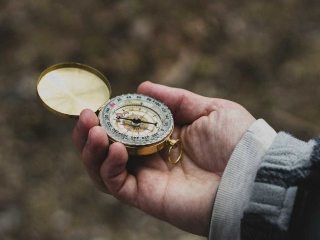 compass in hand