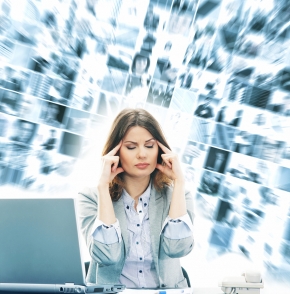 Woman thinking at her desk