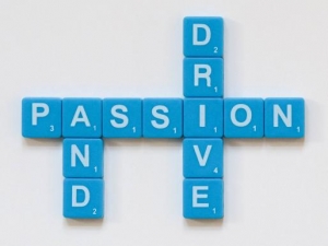 scrabble pieces that say passion and drive