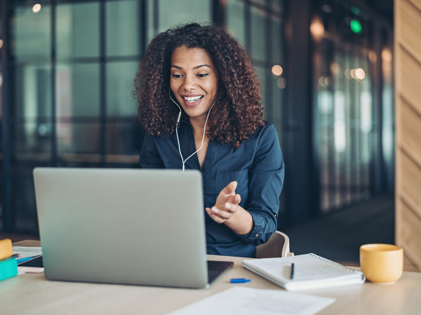 Smiling businesswoman during a video call in the office