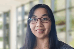 Professional headshot of Joyce Chiu smiling in a professional corporate style.