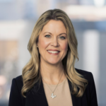 A professional headshot of Nicole Marino